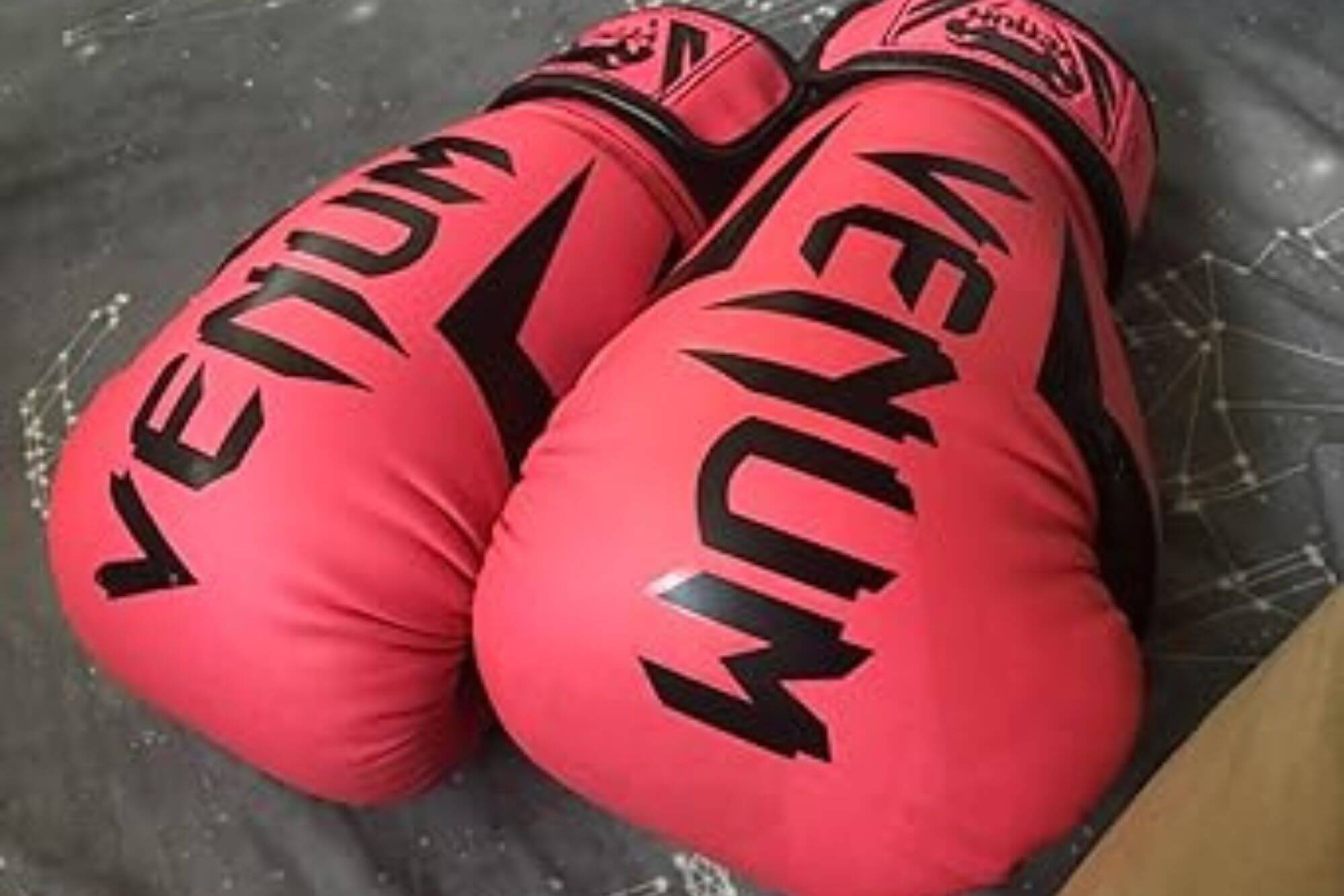 A pair of Venum Elite Boxing Gloves in red color option