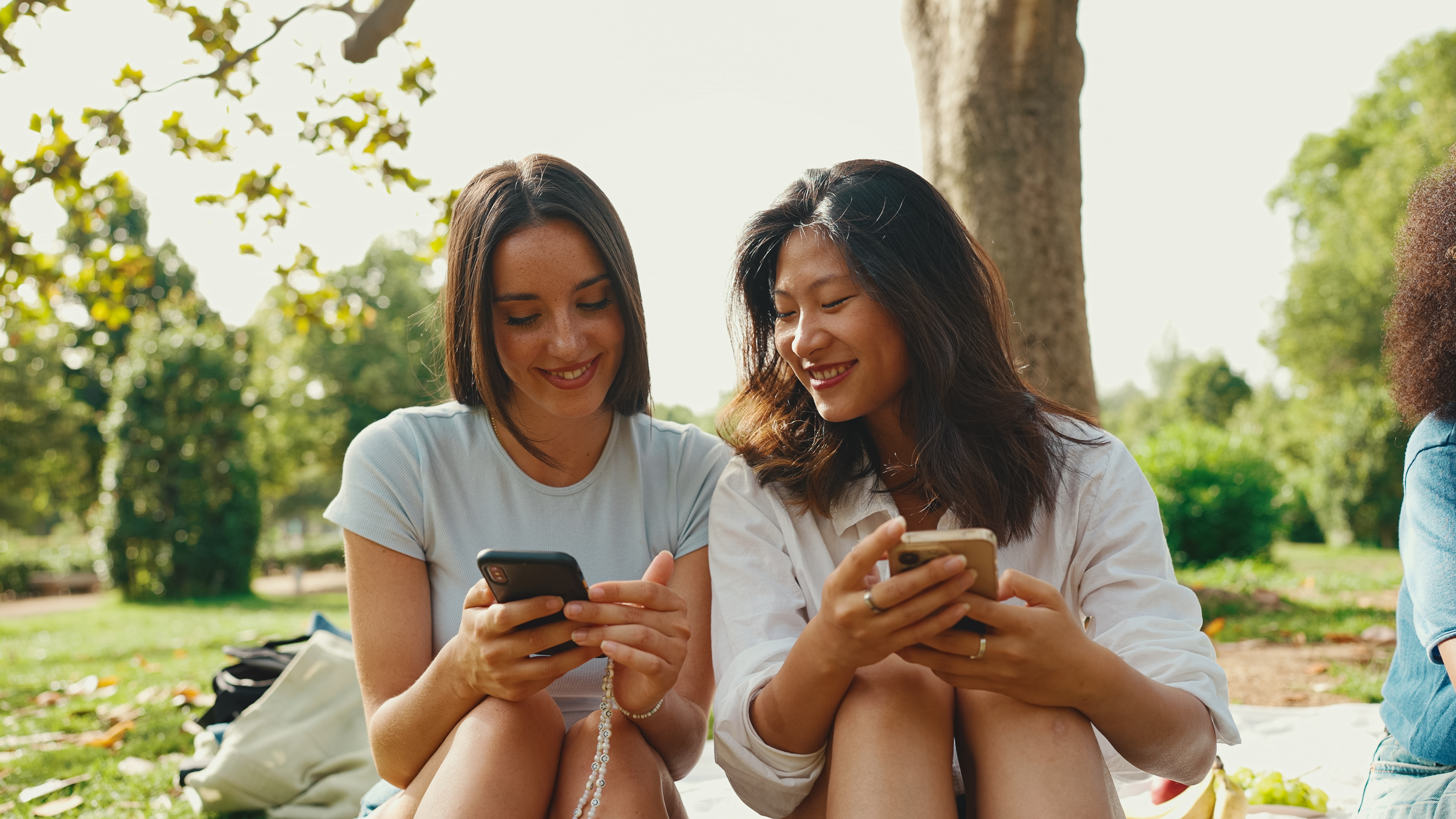 Two women watching video on mobile