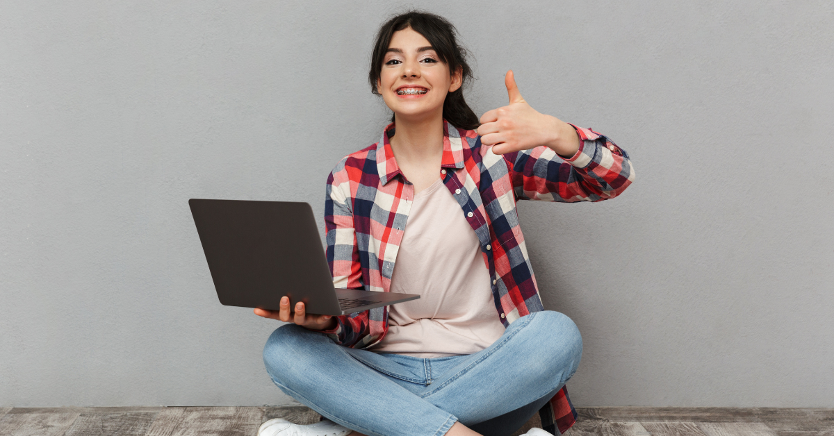 Woman setting the right OnlyFans subscription price while analyzing content performance and subscriber growth.