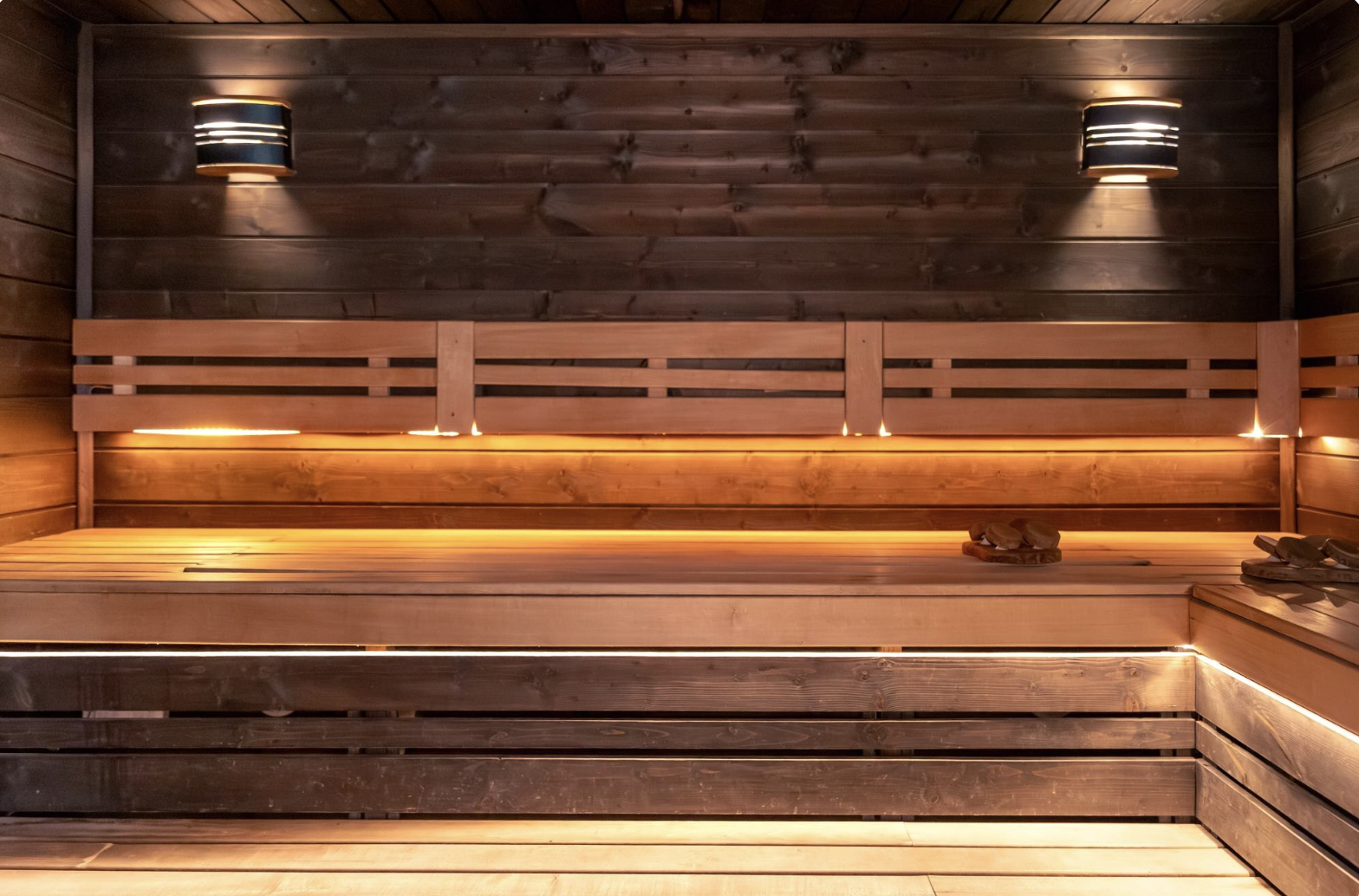 Empty sauna with open warm lights