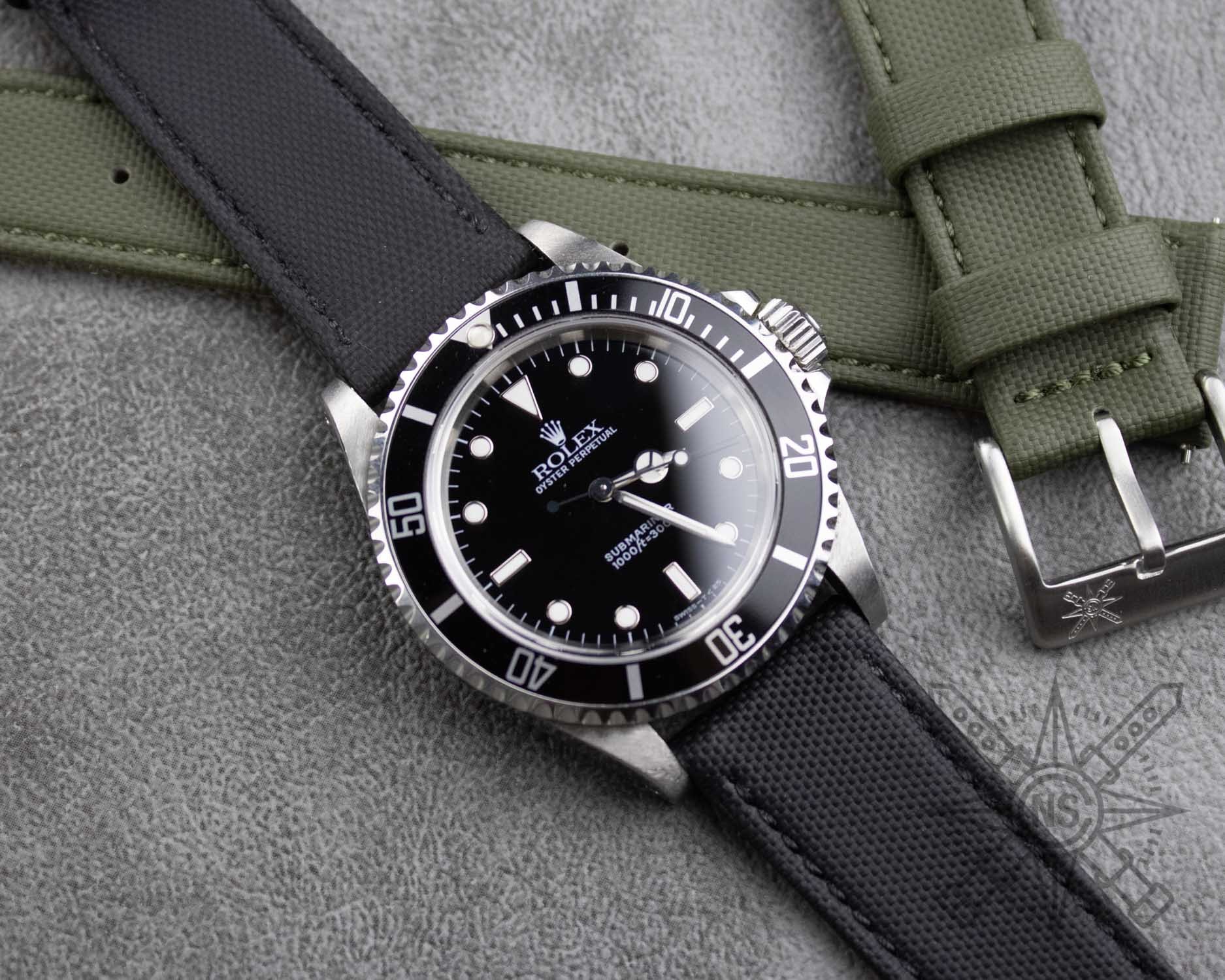 A black sailcloth watch strap displayed elegantly on a watch.