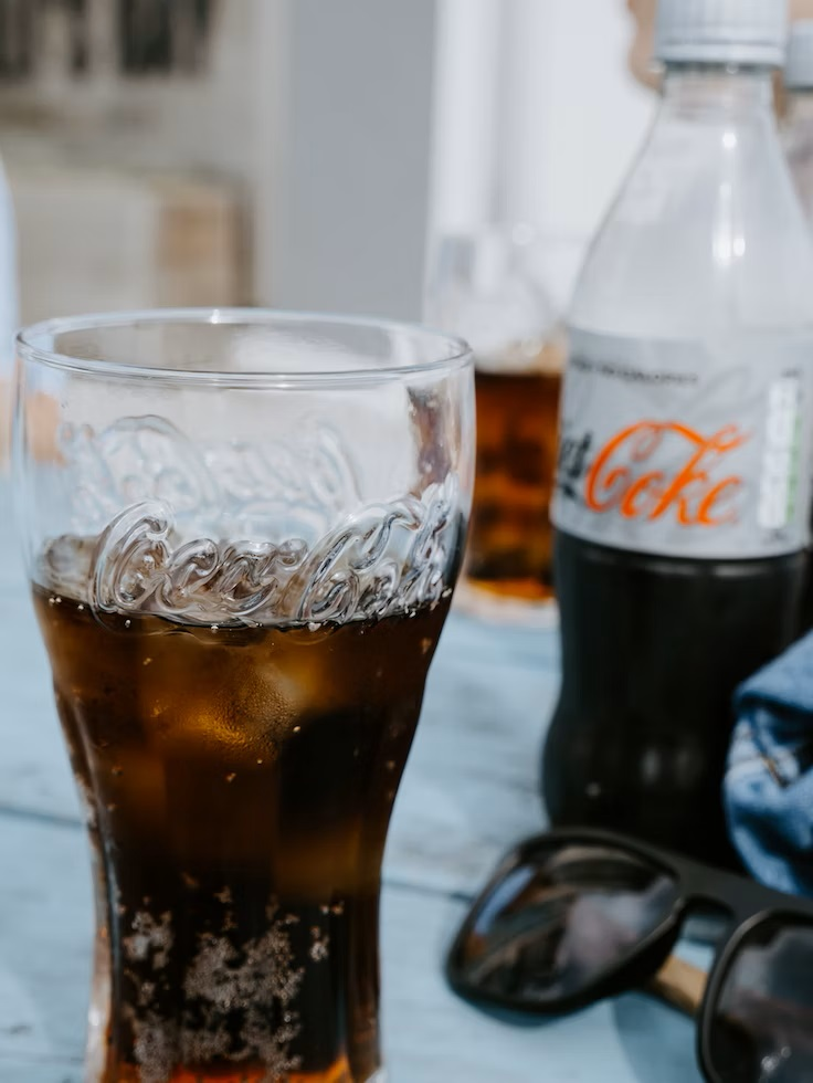 Diet Coca-Cola for cleaning chrome and brass door handles 