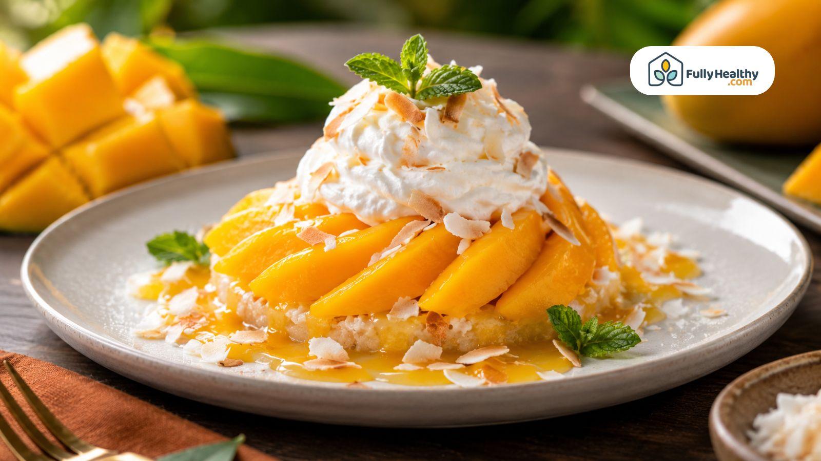 Fresh mango sticky rice topped with whipped cream, toasted coconut flakes, and ripe mango slices.