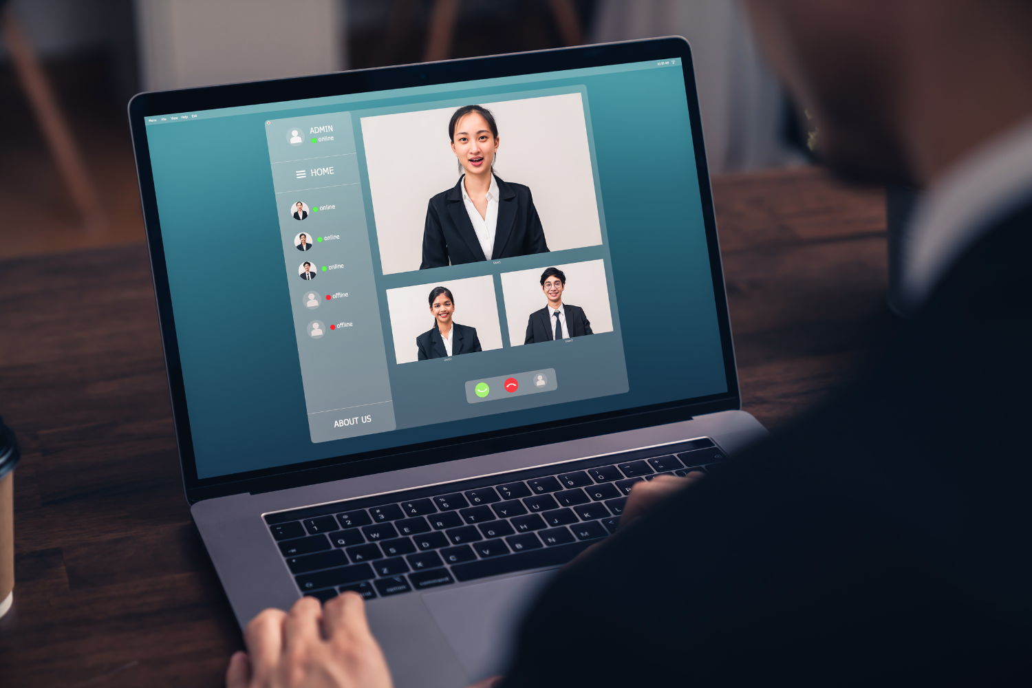A video call between a U.S. manager and Filipino team members.