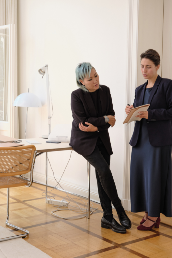 two designers meet in their office