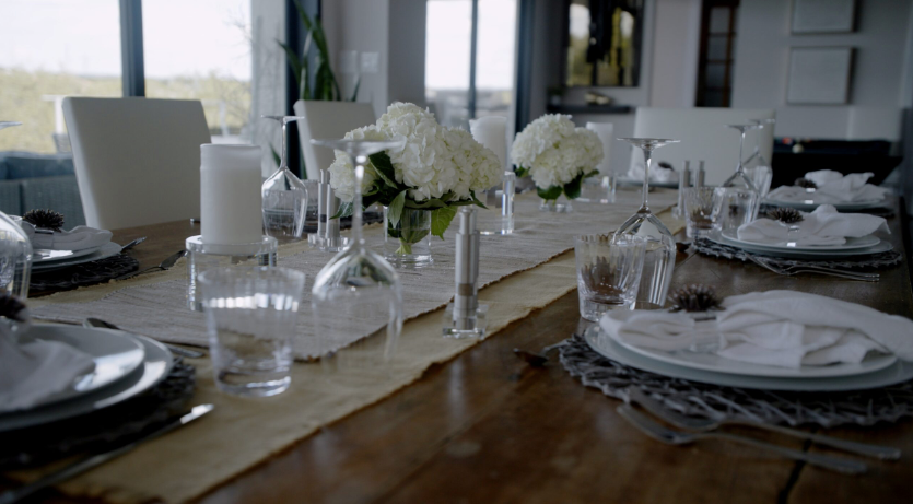 A dining table set up for a dinner party