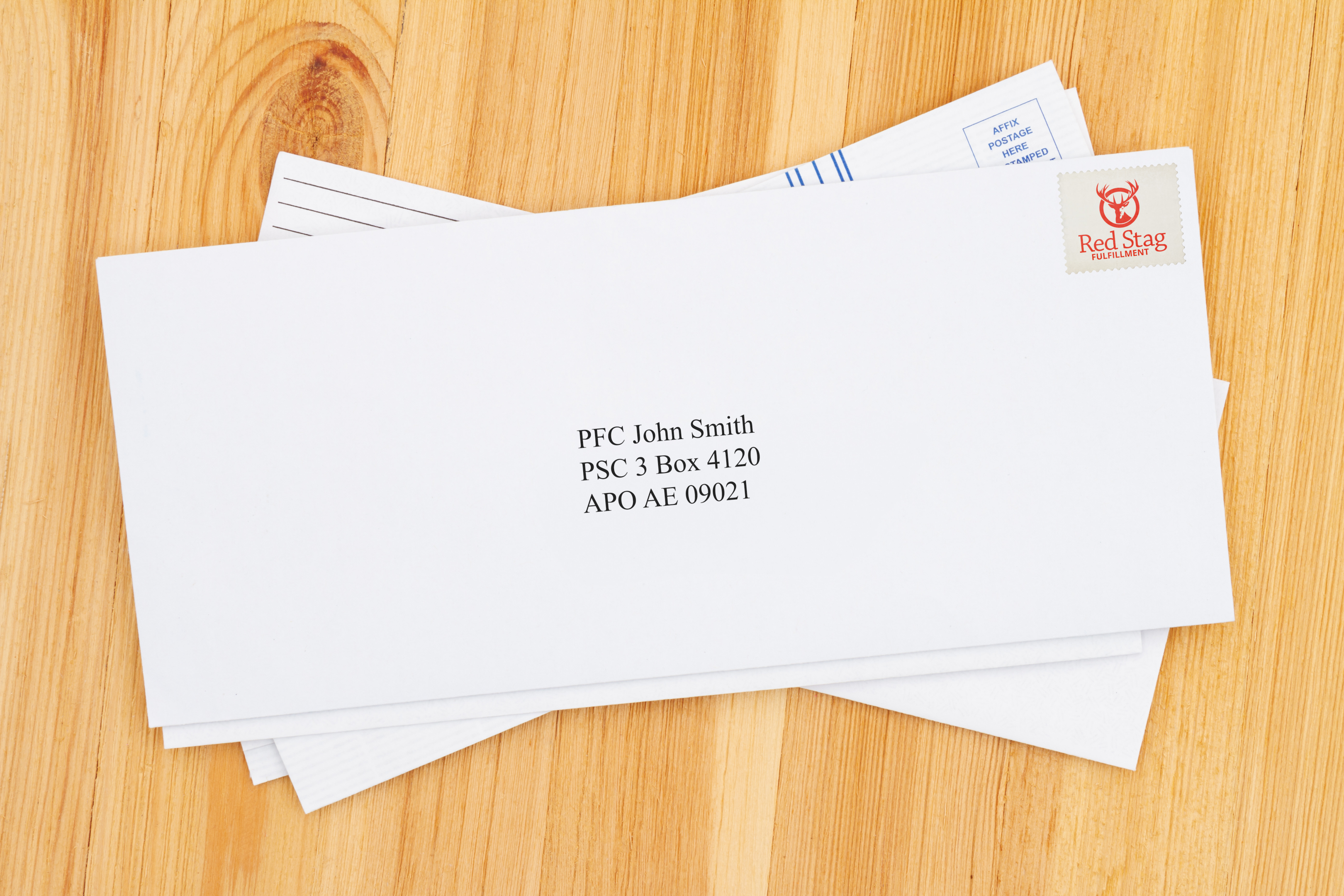 envelope with an APO mailing address: PFC John Smith, PSC 3 Box 4120, APO AE 09021