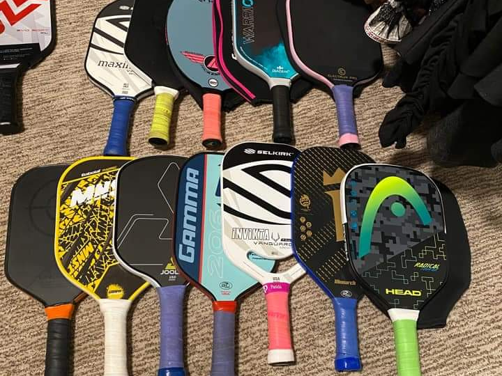 An image showcasing a variety of different size and shape paddles.