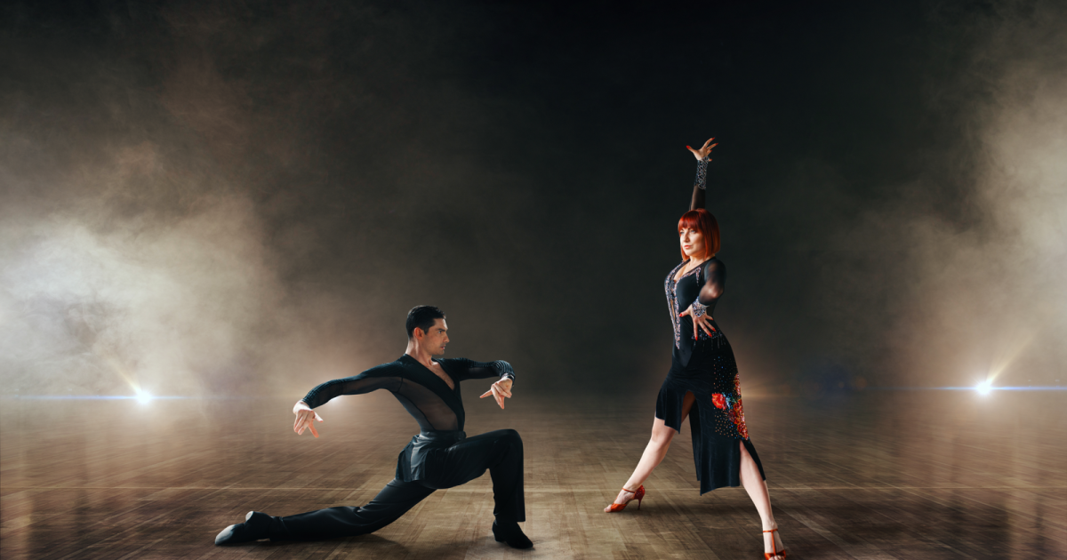 An image of two dancers gracefully performing in a ballroom, representing the journey of overcoming obsessive-compulsive disorder (OCD) in NYC through a combination of therapy approaches, including medication, showcasing the positive results of comprehensive treatment.
