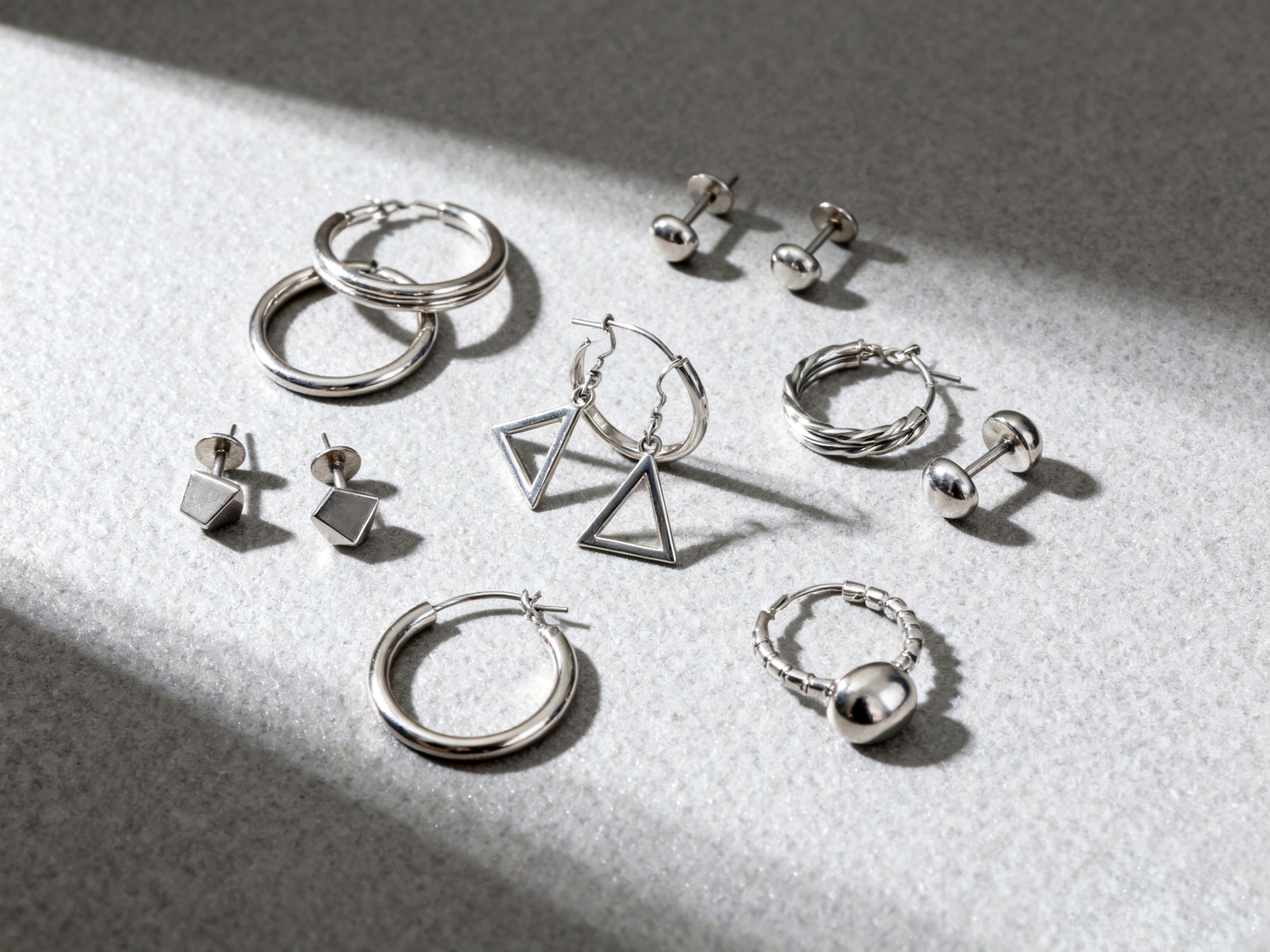 Change your mood with various styles of silver earrings for women.