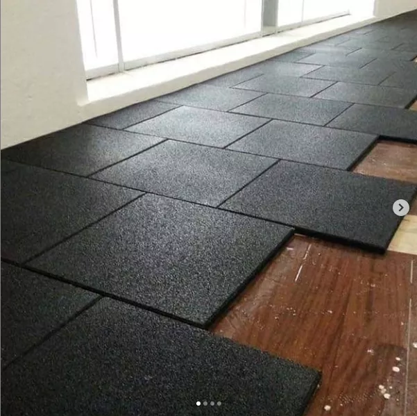 Black Rubber Gym Tiles laid in Brick Pattern