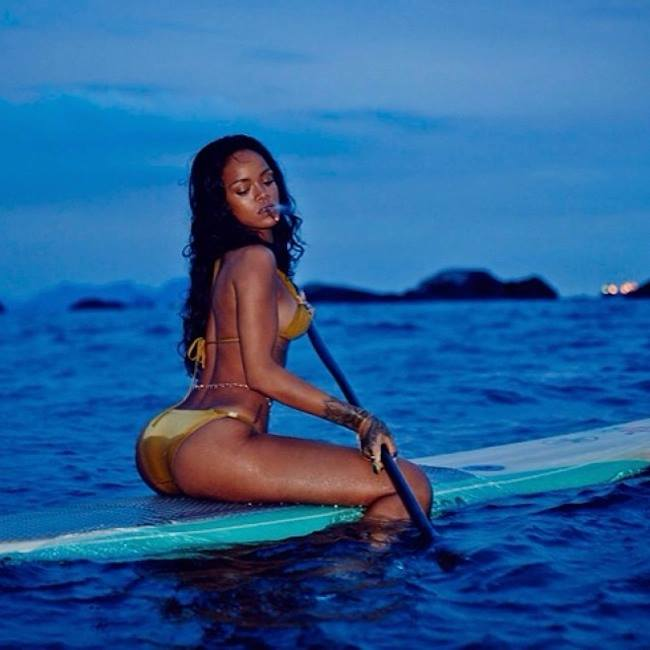 celebrity on a sup board