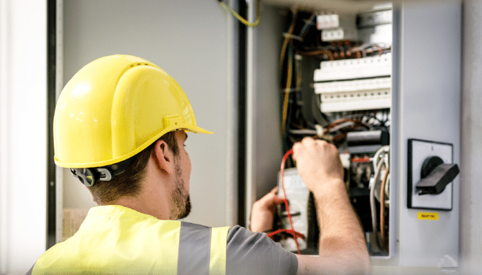 Person making repairs due to industrial equipment downtime