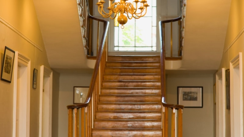 Ceiling stairwell lighting direction with staircase affects the entire space