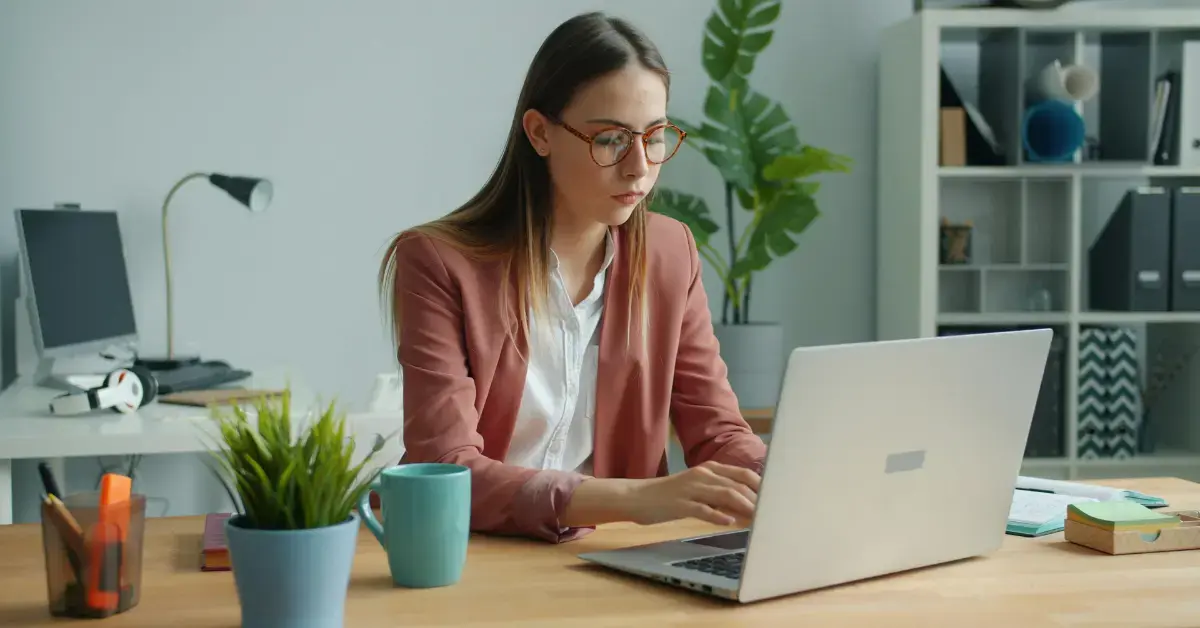 Woman reviewing IRS tax records and timeline to understand how long does a federal tax lien last.