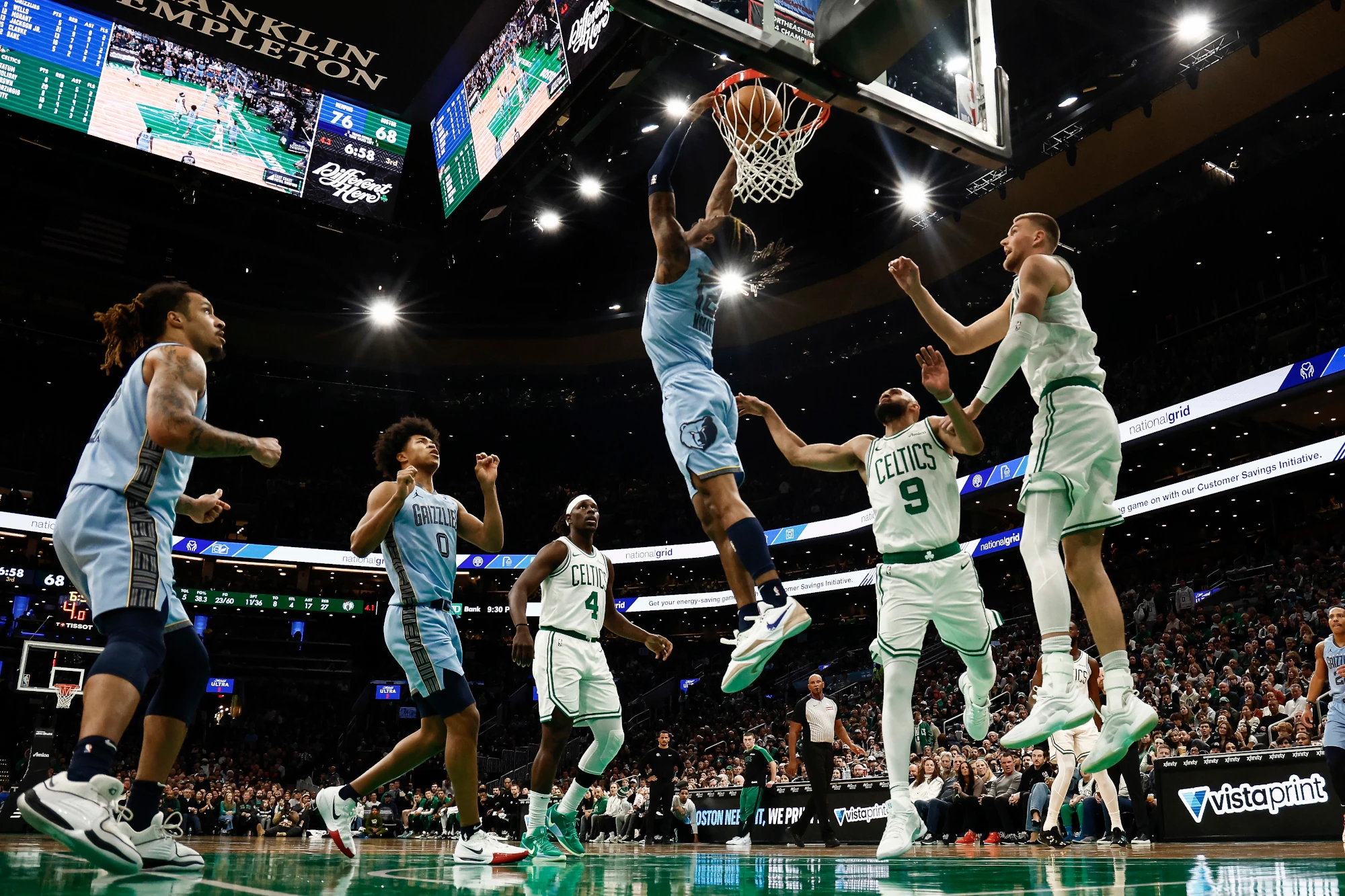 Ja Morant of the Memphis Grizzlies does a reverse dunk against the Boston Celtics during the second half at TD Garden on December 7, 2024 in Boston, Massachusetts. The Memphis Grizzlies take position #5 for our NBA power rankings.