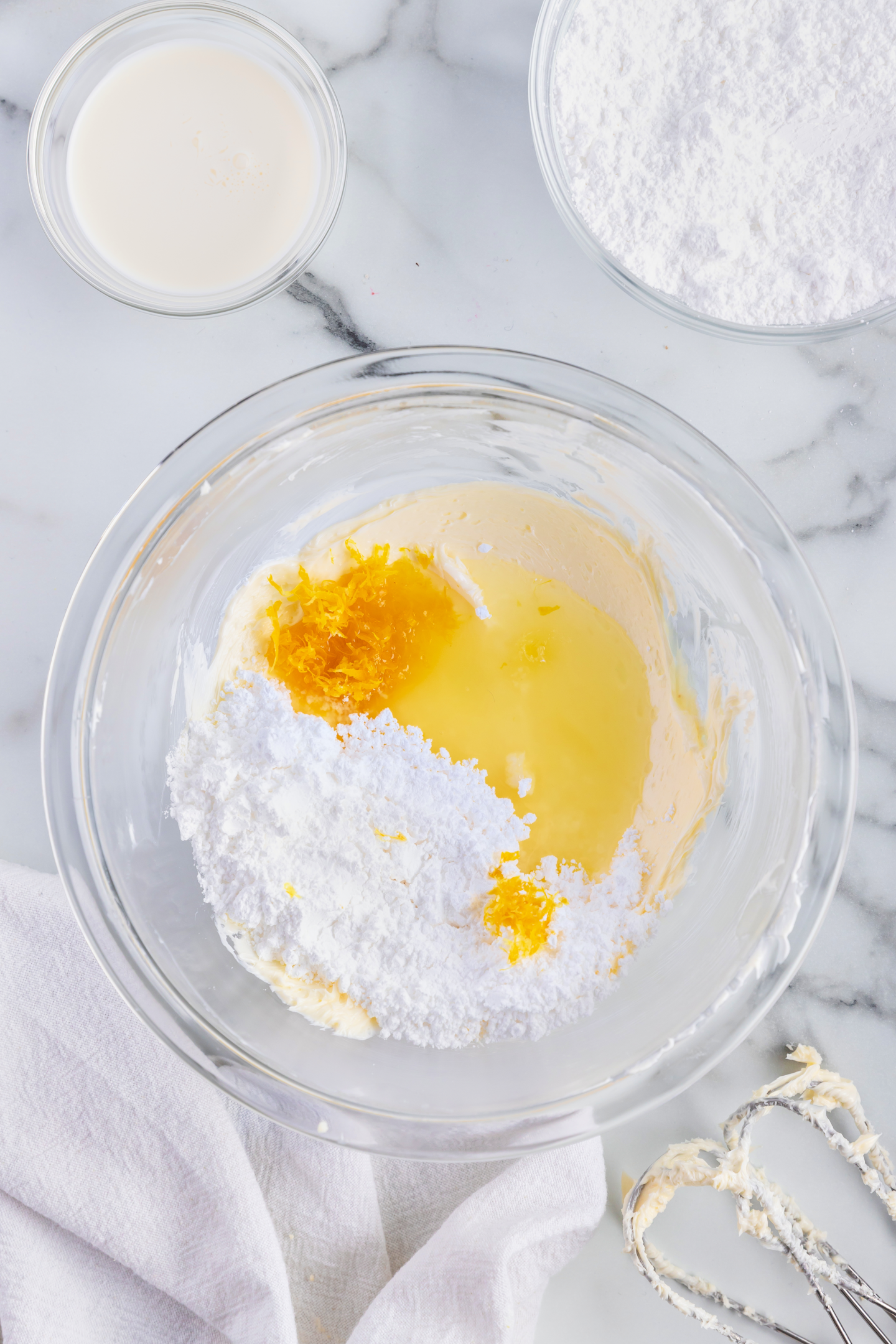 lemon buttercream frosting ingredients in a bowl
