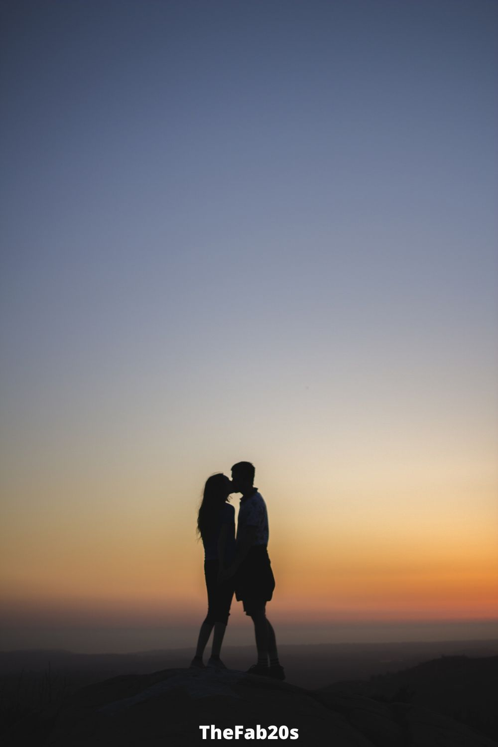 Couple kissing at sunset - Healthy relationships have clear expectations and boundaries