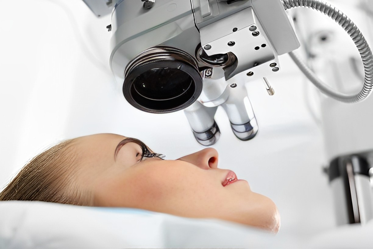 A photo of a young girl receiving eye care at a clinic