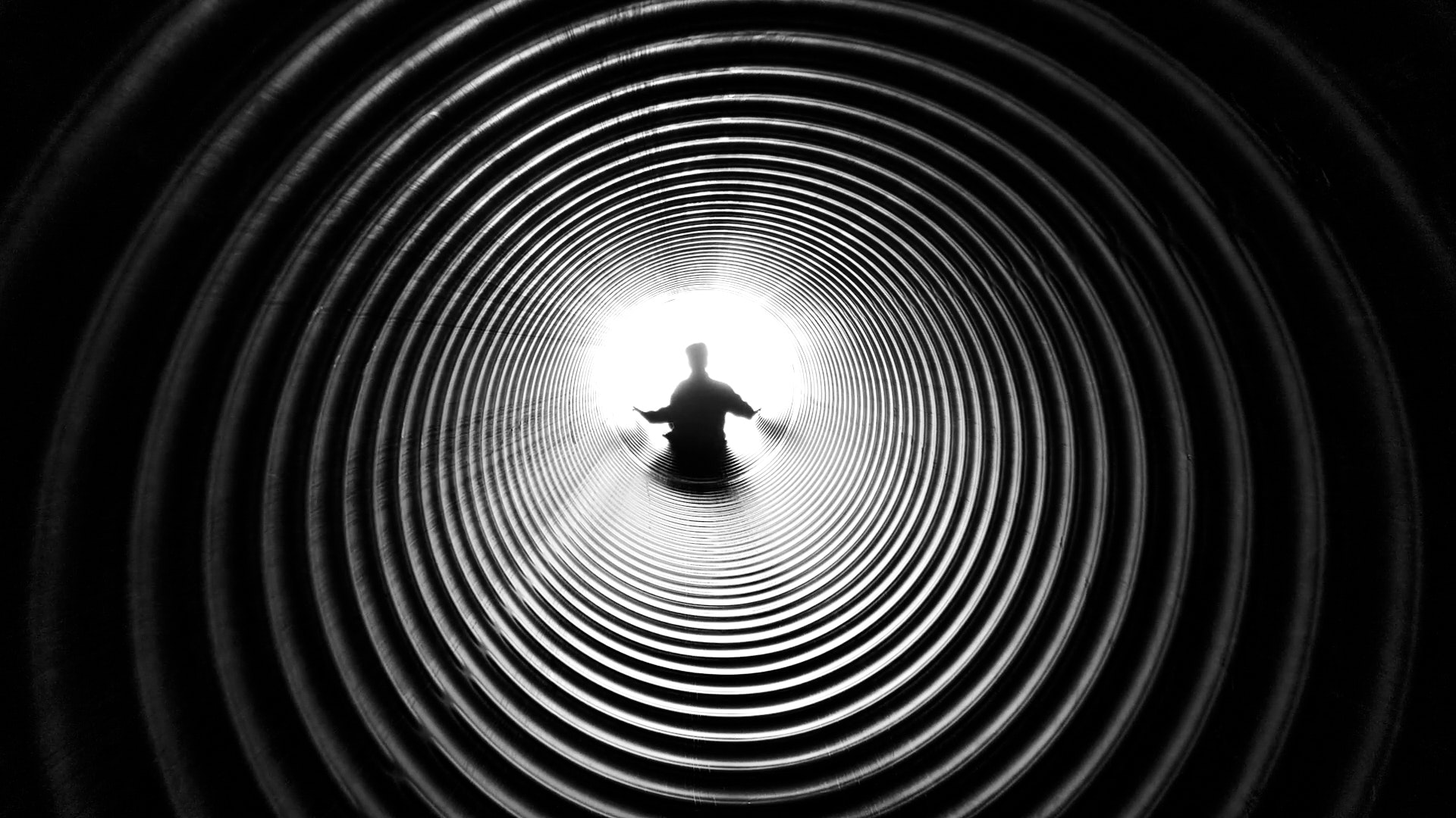 Searching through a dark tunnel