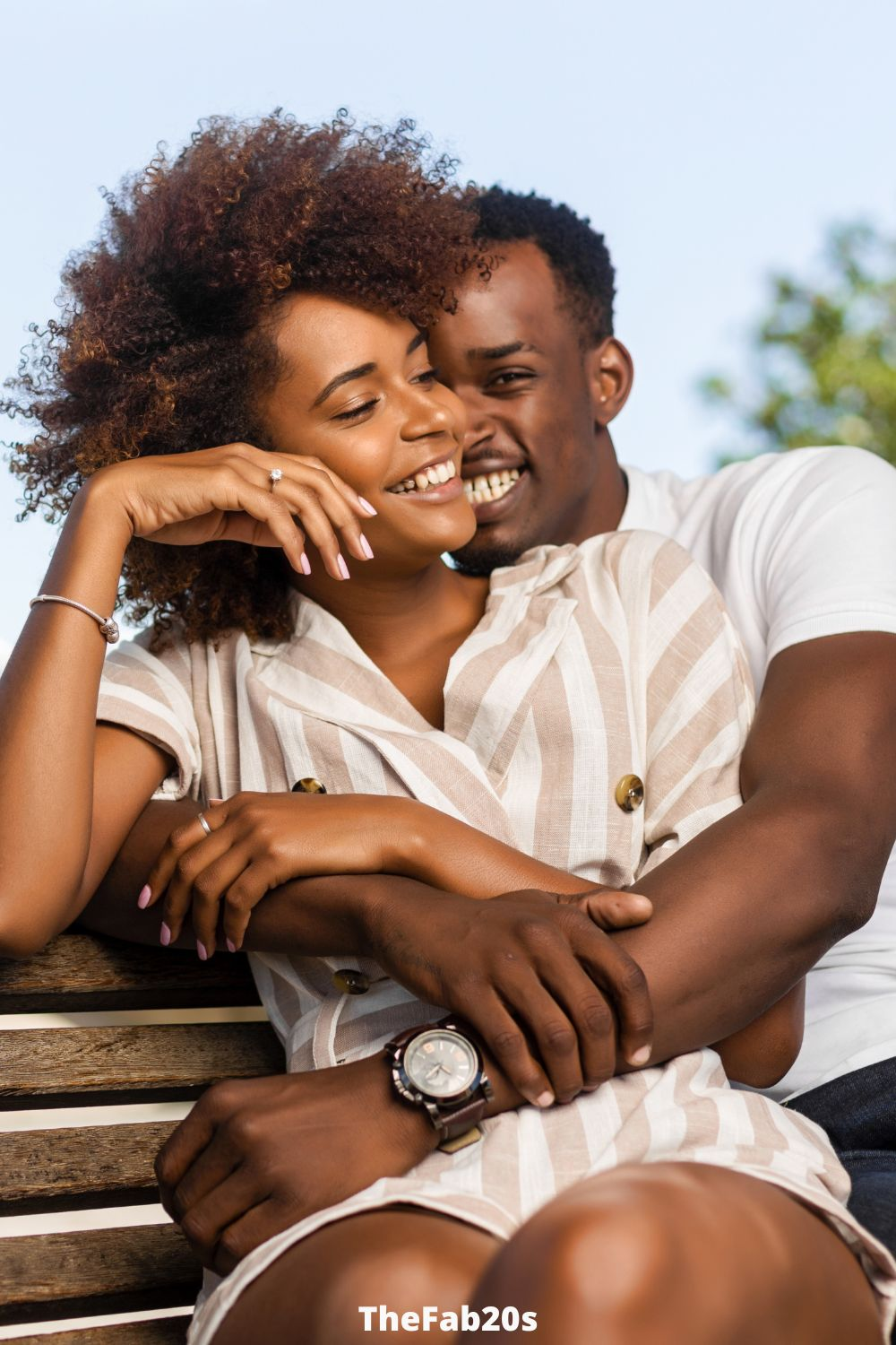 Cute couple hugging on a bench