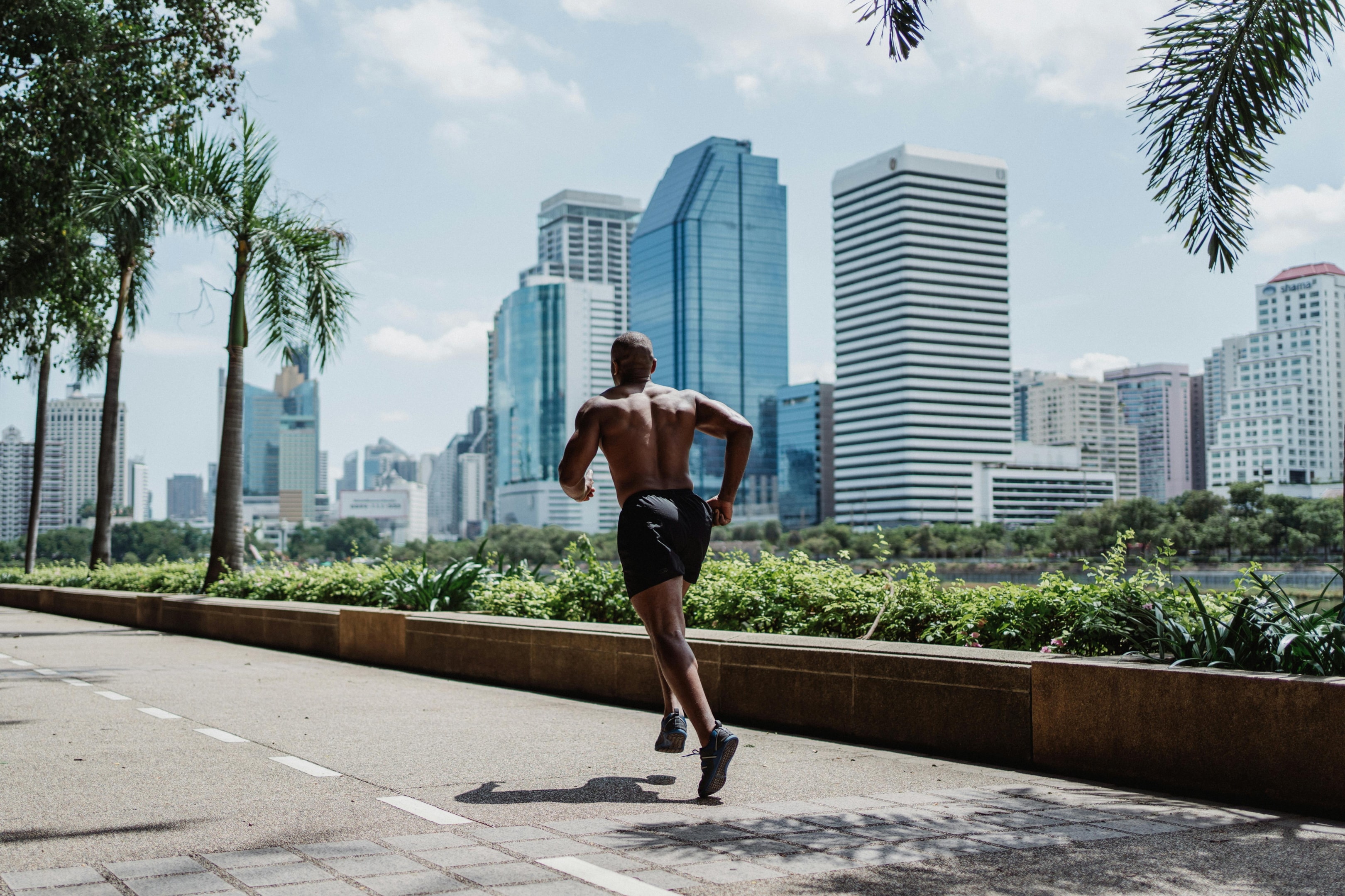 Photo by Ketut Subiyanto: https://www.pexels.com/photo/shirtless-man-on-black-shorts-running-in-a-city-pathway-4803916/