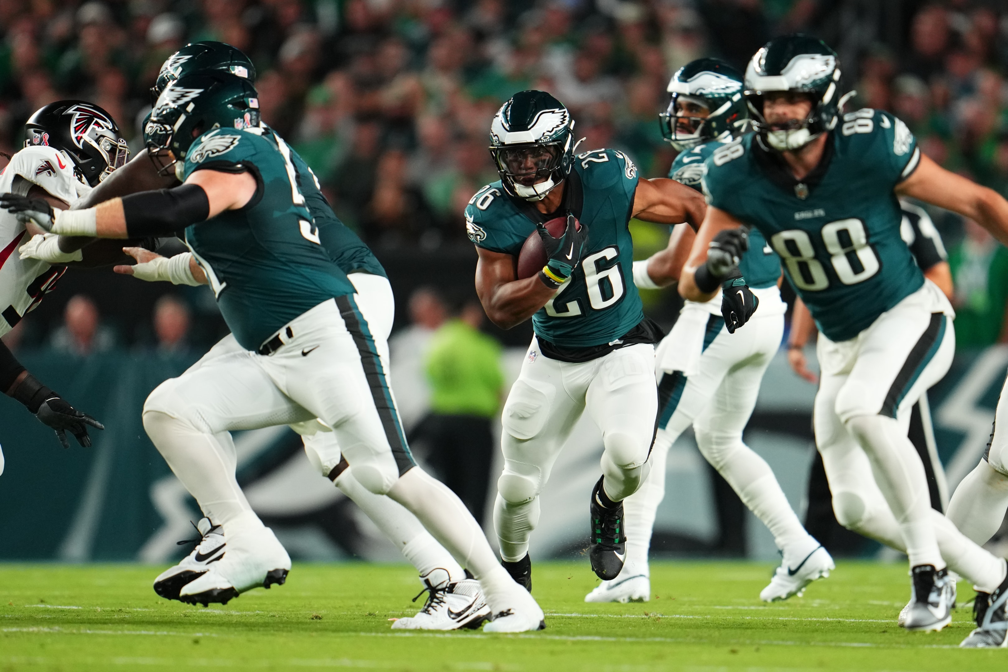 Saquon Barkley of the Philadelphia Eagles carries the ball in a football game at Lincoln Financial Field on September 16, 2024 in Philadelphia, Pennsylvania.