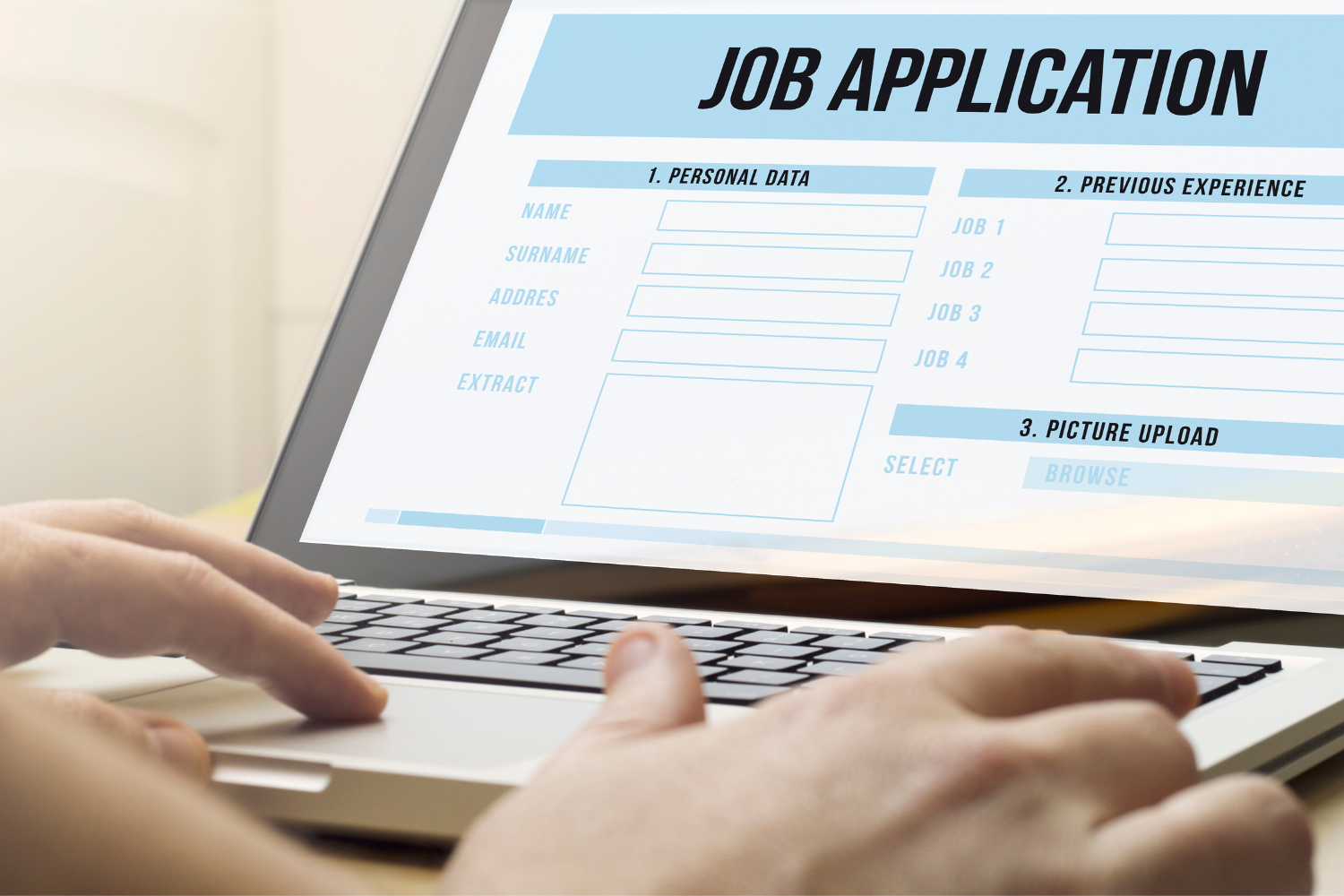 Person filling out job application.