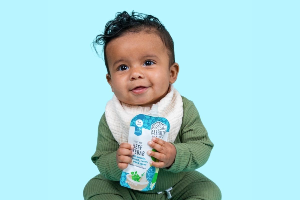 baby enjoying beef as a puree