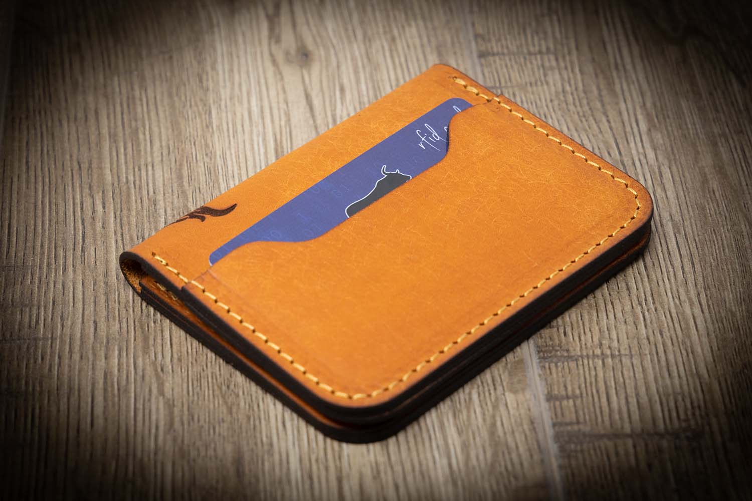 An eco-friendly bifold wallet with a modern design and RFID blocking lining.