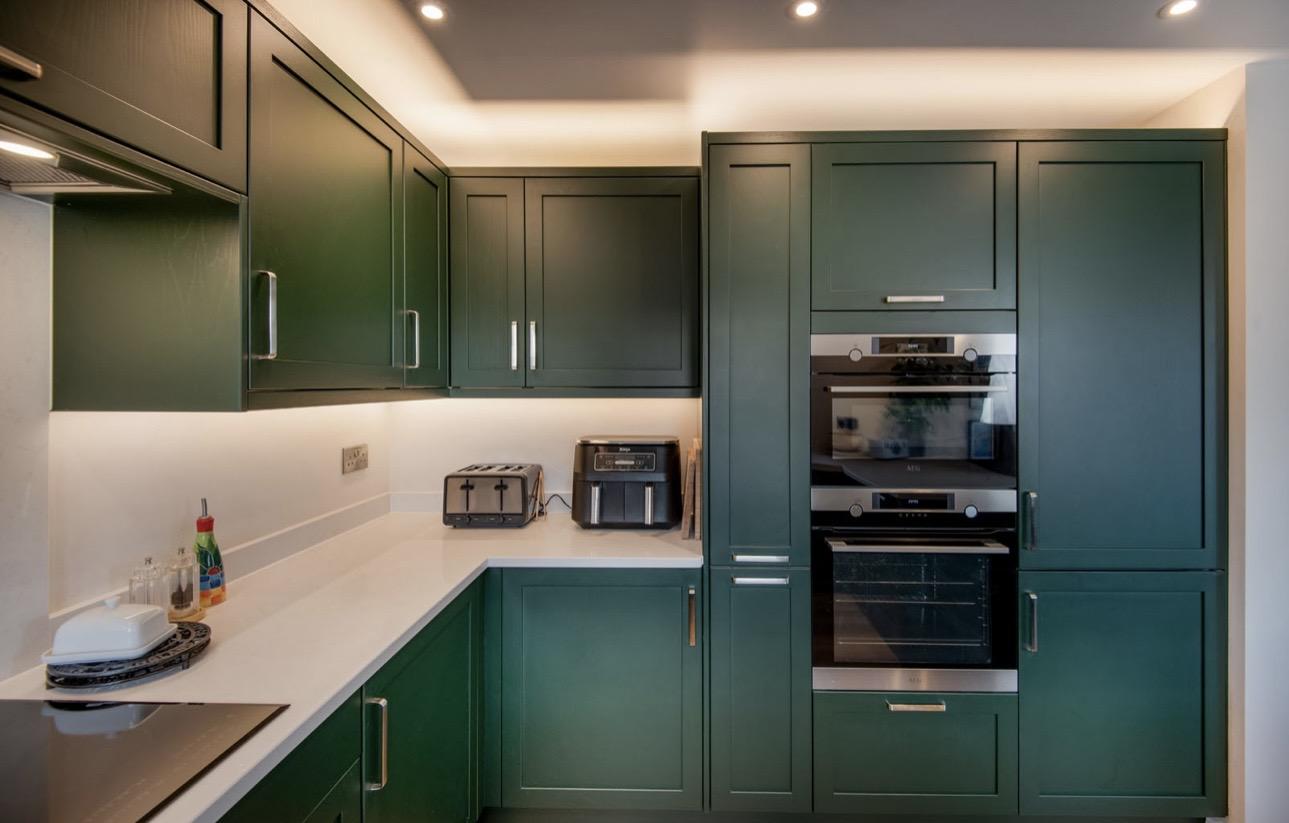 Dark green in small kitchen
