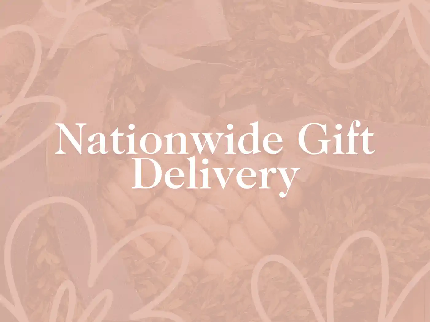 A beautifully arranged gift basket with a ribbon, showcasing the Nationwide Gift Delivery service. Fabulous Flowers and Gifts - Nationwide Gift Delivery