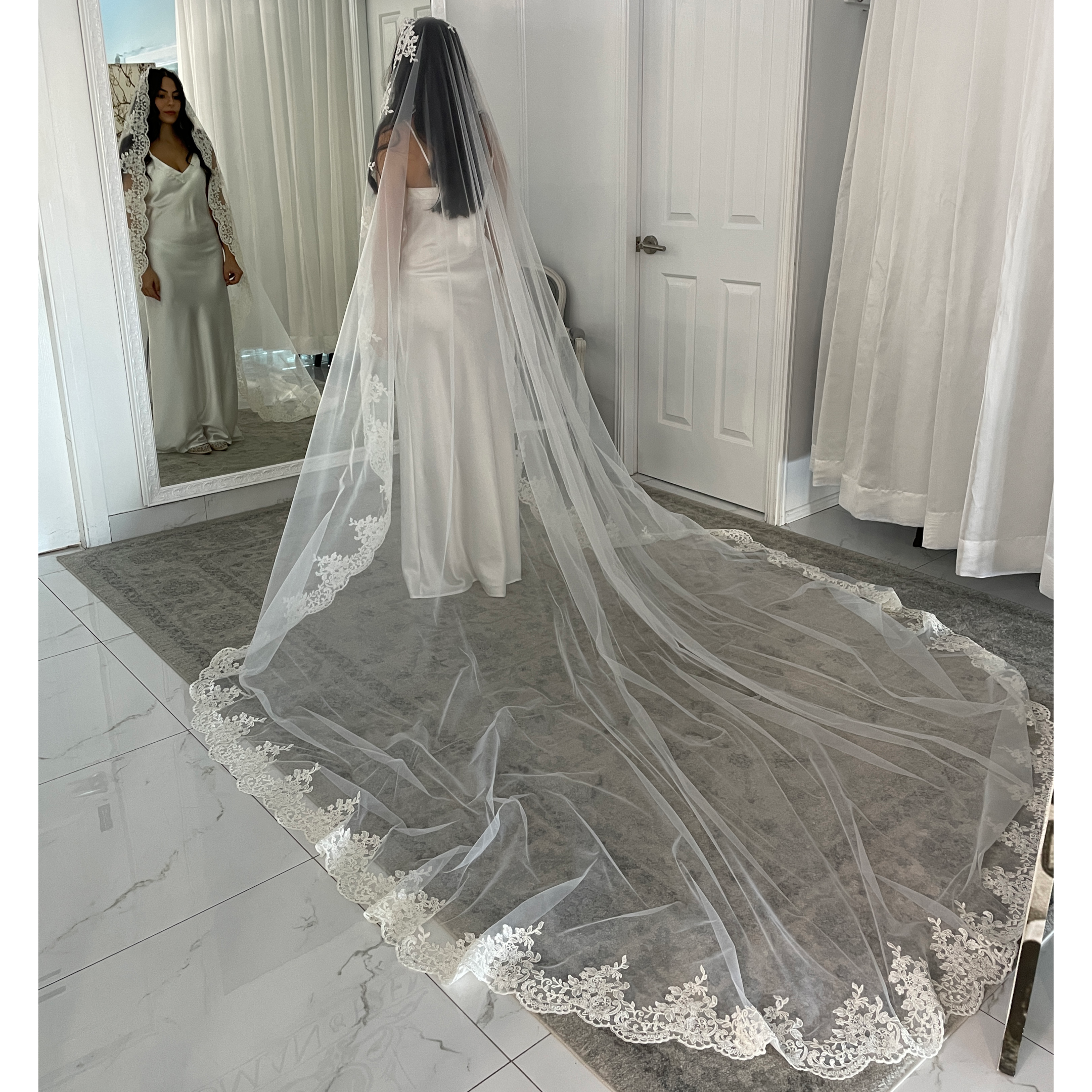 This exquisite 3 metre authentic Mantilla Veil is just divine. The peaks in the beaded lace added to the drama of the style.