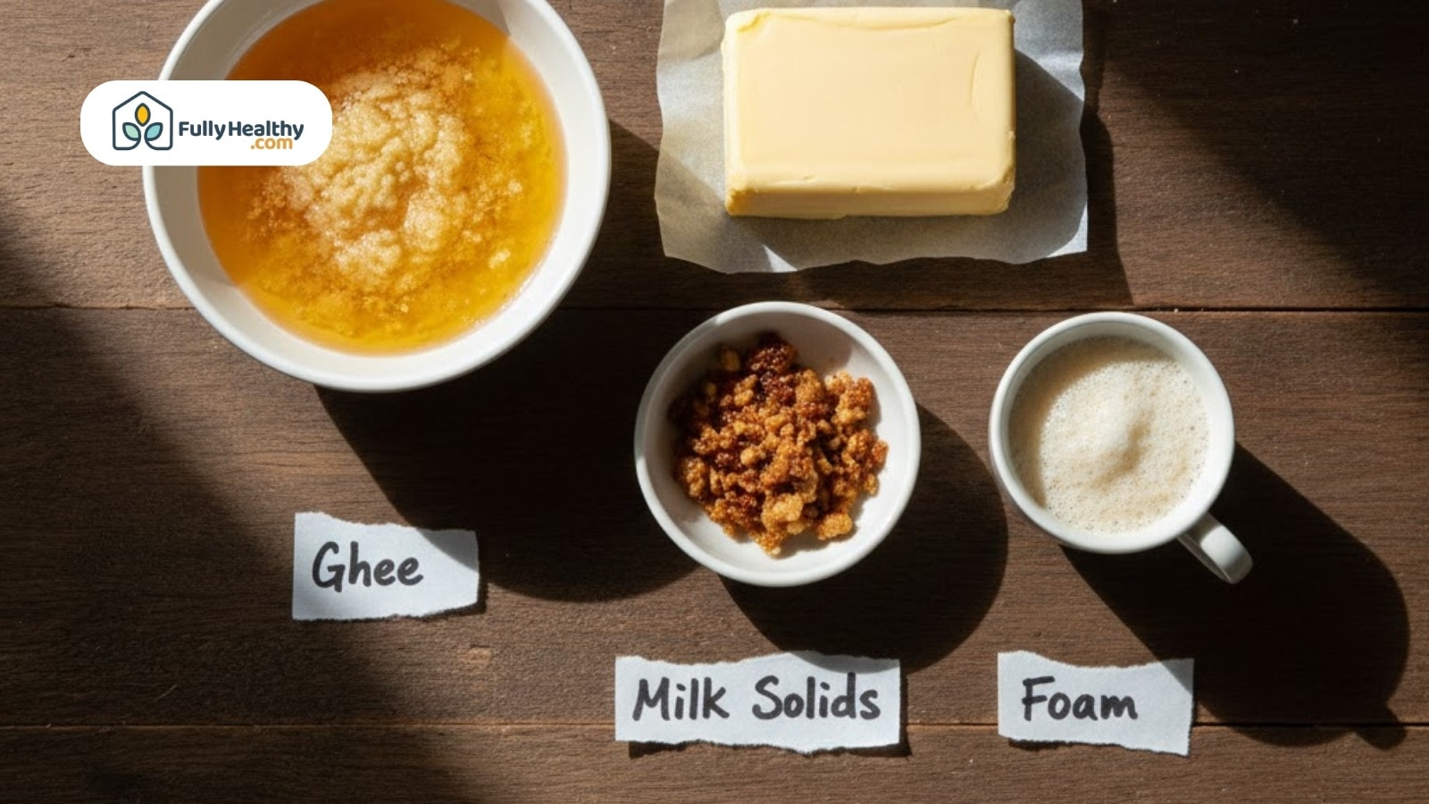 Ghee, milk solids, butter block, and foam labeled overhead