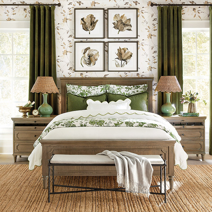 symmetrical bedroom design with scalloped seagrass rattan lamps