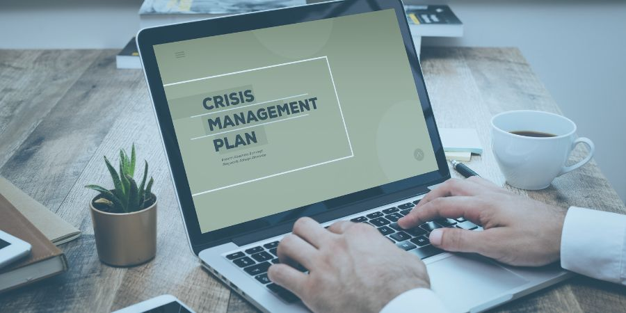 Laptop displaying a crisis management plan