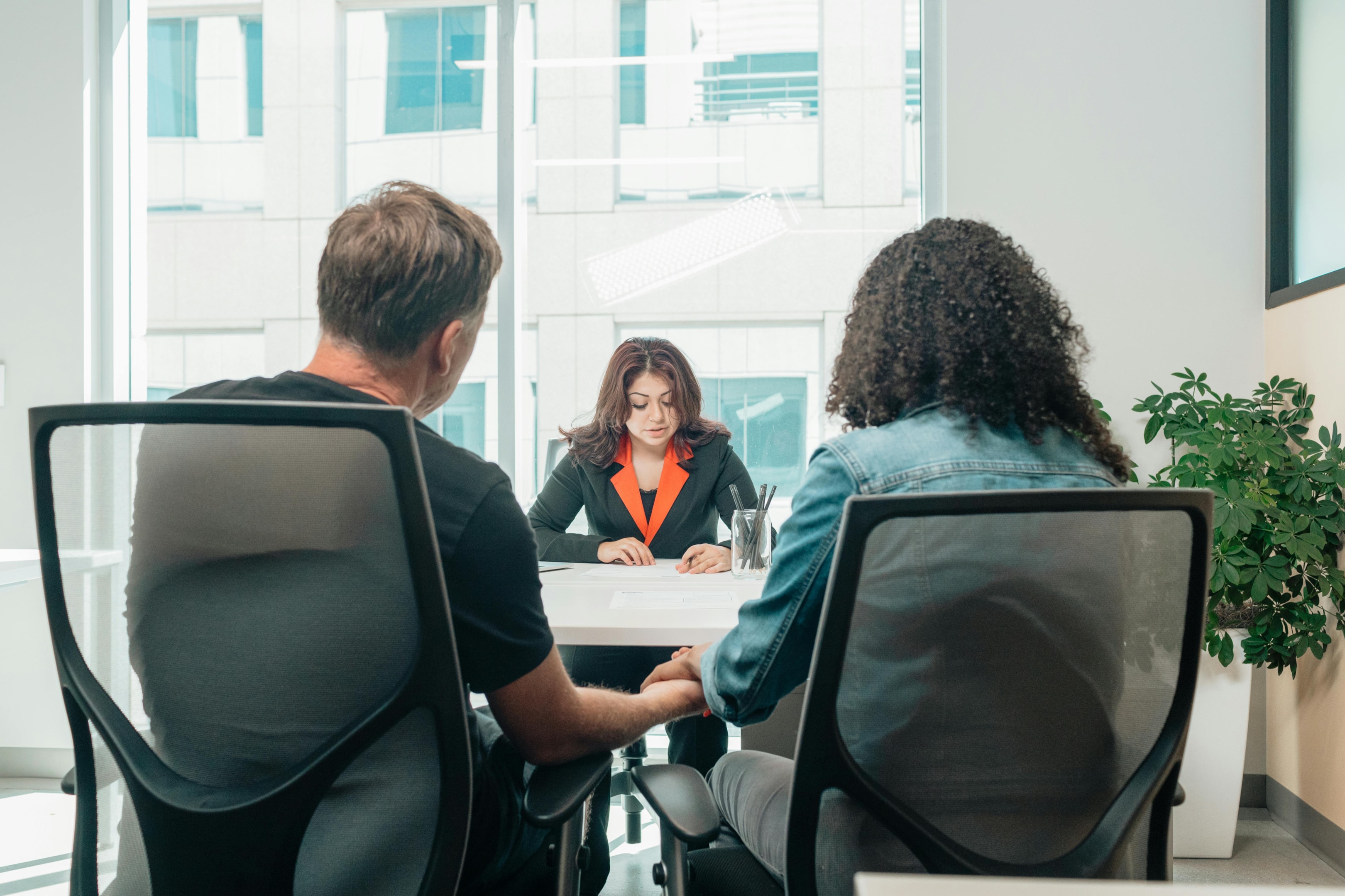 Real estate attorney meets with beneficiaries of a probate property.