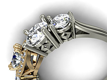 Custom designed engagement ring with 5 diamonds