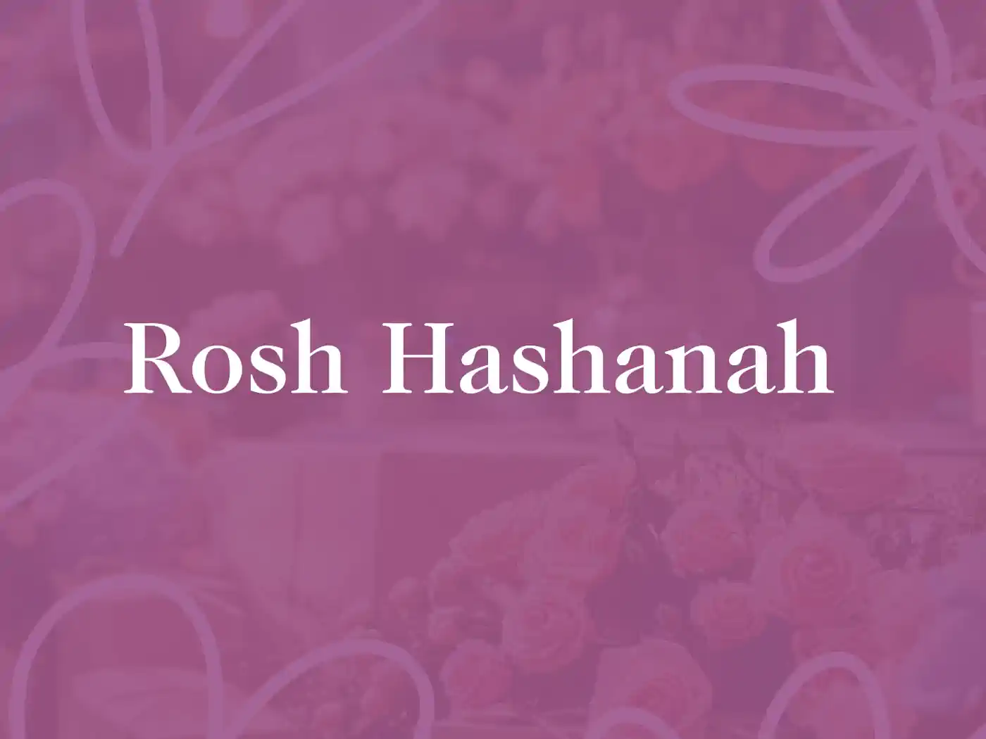 The words "Rosh Hashanah" on a pink floral background. Fabulous Flowers and Gifts - Rosh Hashanah Collection.