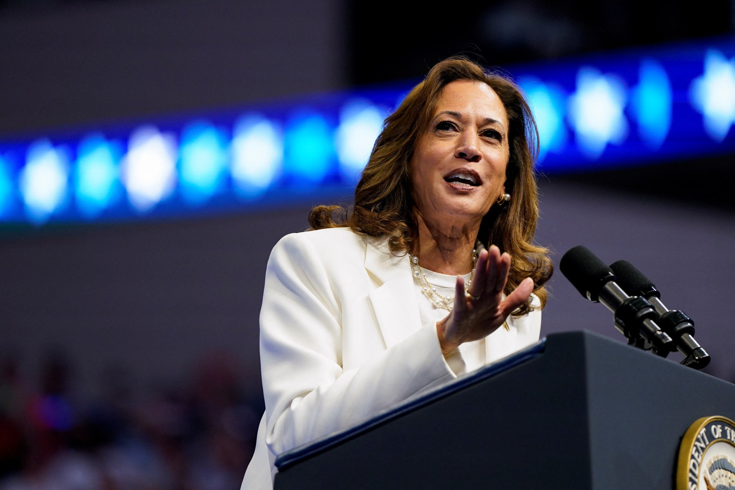 Image of Kamala Harris talking at a podium.