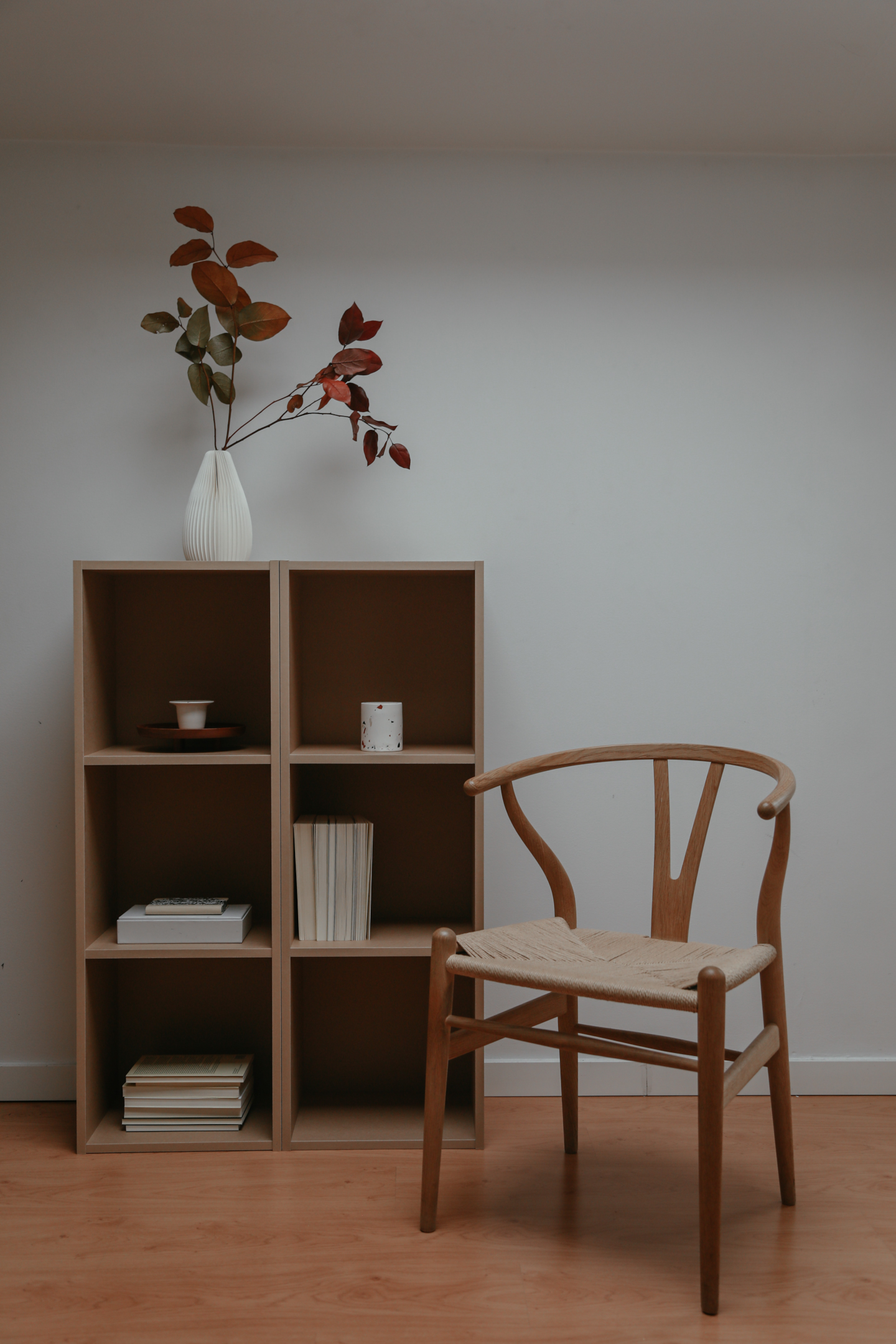 Image credit: https://www.pexels.com/photo/photo-of-a-brown-chair-near-a-plant-on-top-of-a-bookcase-6956499/