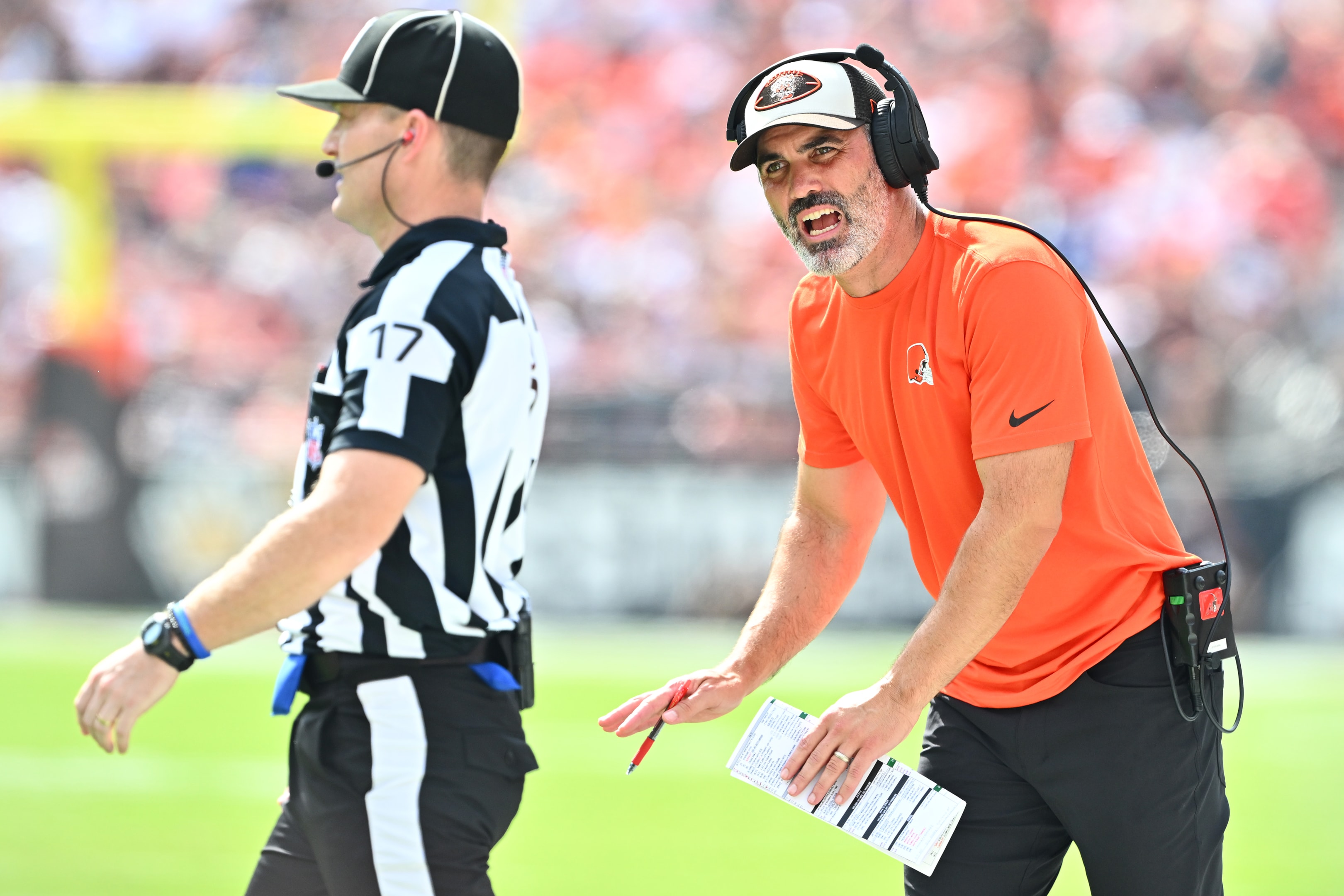 Kevin Stefanski, head coach of the Cleveland Browns, speaks to a back judge during a game against the New York Giants at Cleveland Browns Stadium on September 22, 2024 in Cleveland, Ohio. 