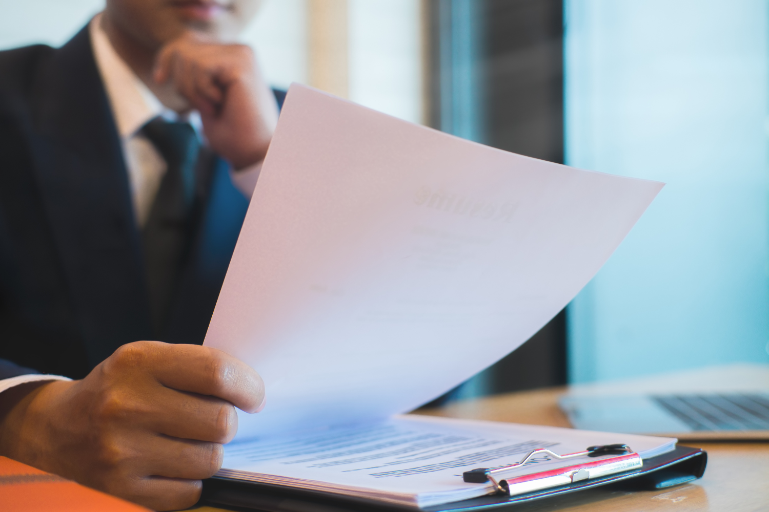 Business owner reading a document.