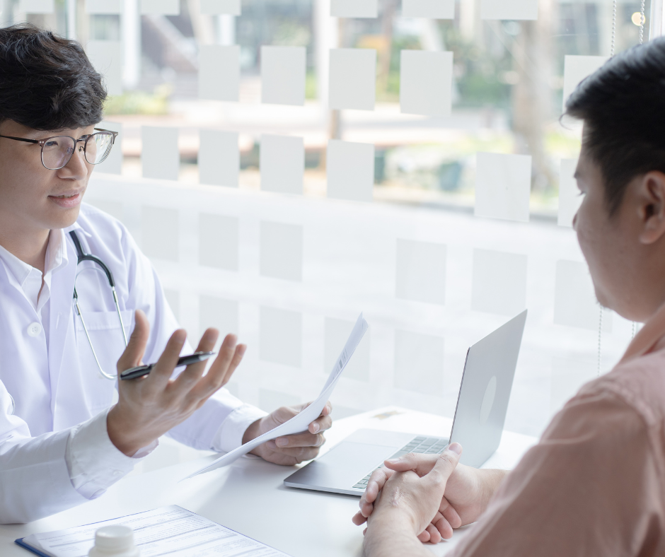 A medical professional talking to a patient about personalized treatment plans