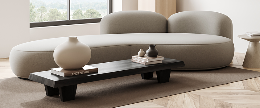 This dark wood, zen style coffee table is the perfect height for it's complementary sofa, reaching no higher than the seat cushions.