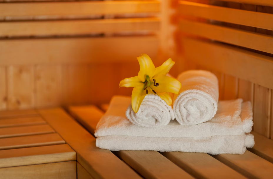 Relaxing sauna with fresh towels.