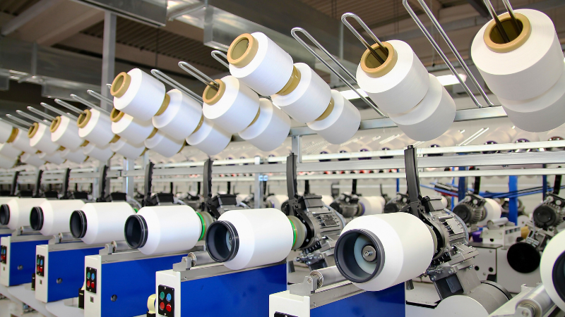 A factory full of rolls of fabric