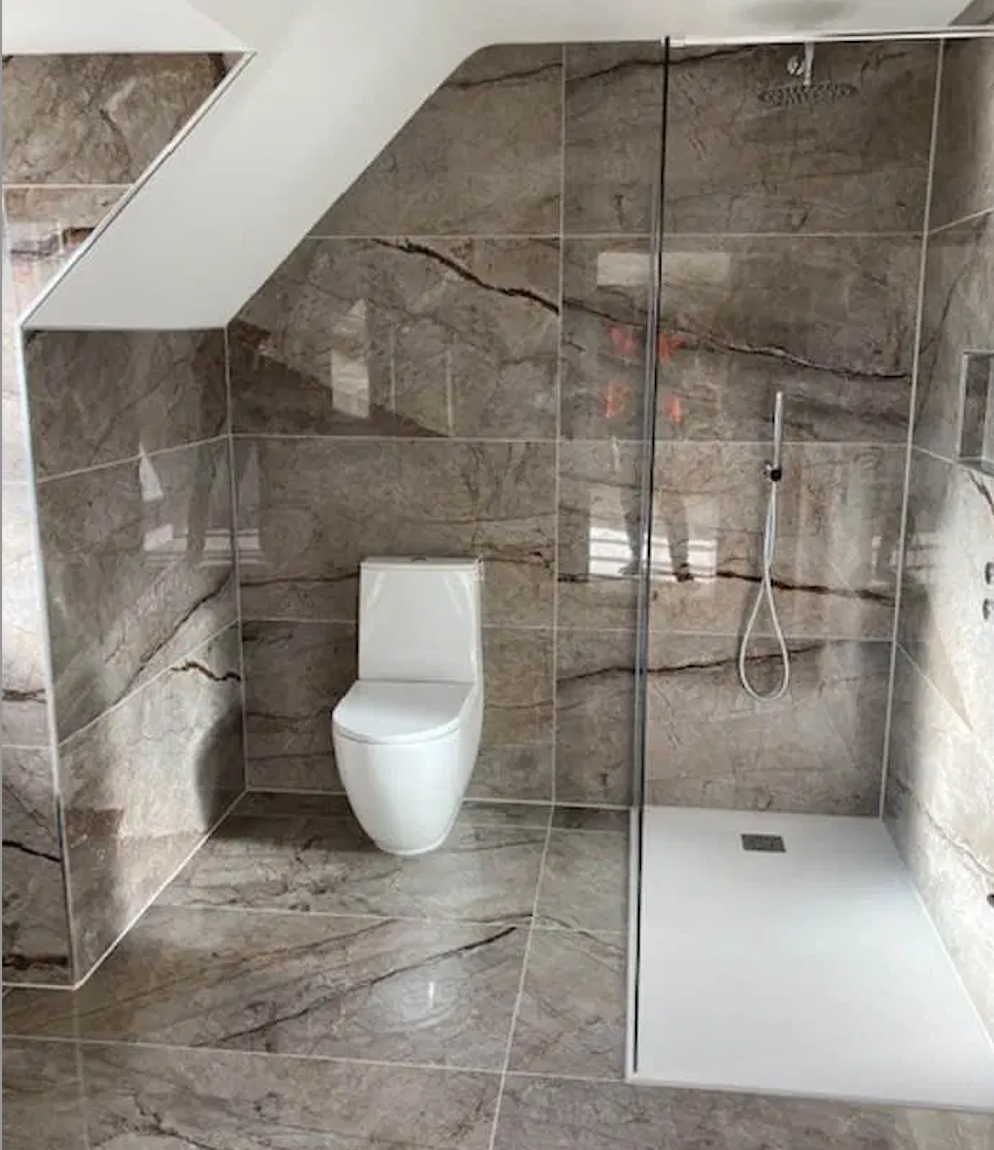 The San Pedro Dove Grey Tiles from Imola Marble Tiles are a perfect example of large format tiles transforming small spaces into spacious rooms.