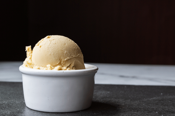 A bowl of soft ice cream safe to eat after tooth extraction