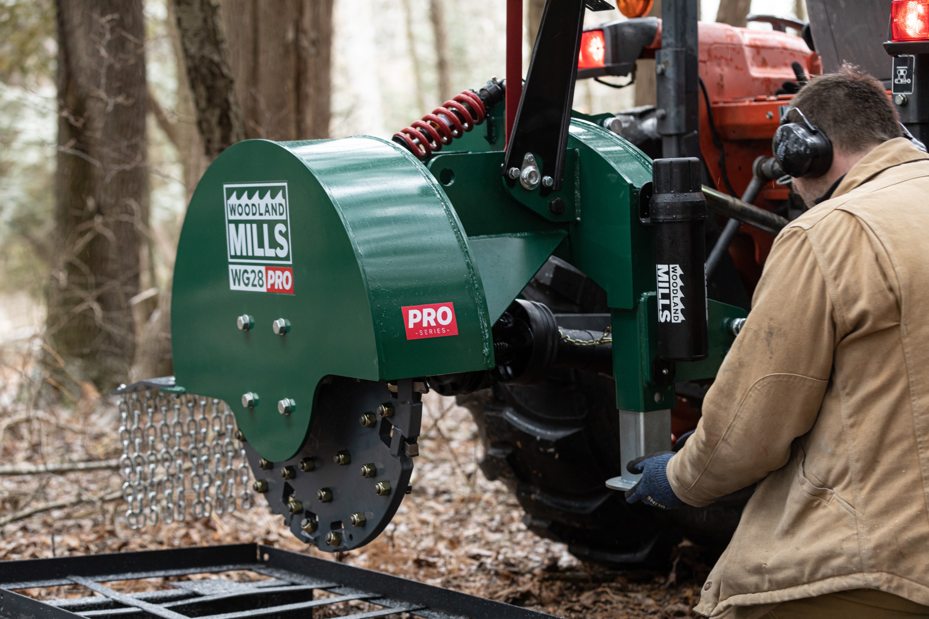 A Woodland Mills WG28 PRO stump grinder taking out a full line of stumps. 